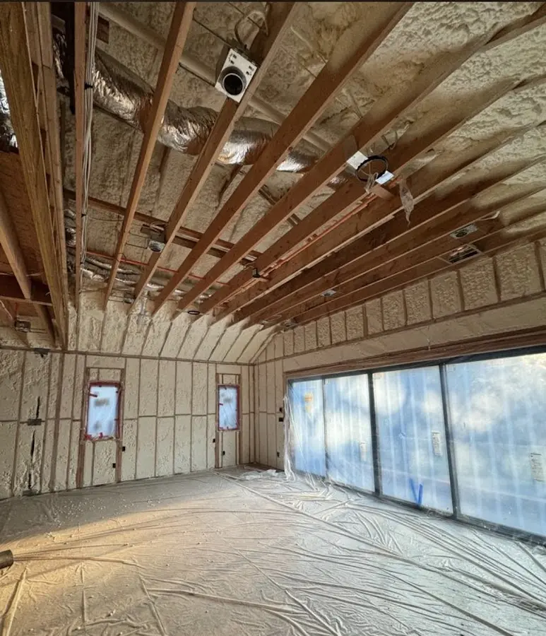 Interior walls and ceiling insulated with spray foam during new construction in Putnam Valley